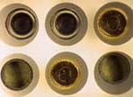 Eliminating Hot Spots: Polarizers over Light Source and Lens