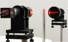 A telecentric illuminator system imaging thread diameters on a post
